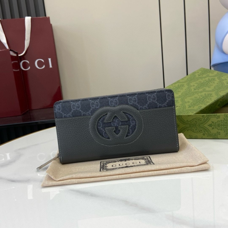 G*u*i clutch bags